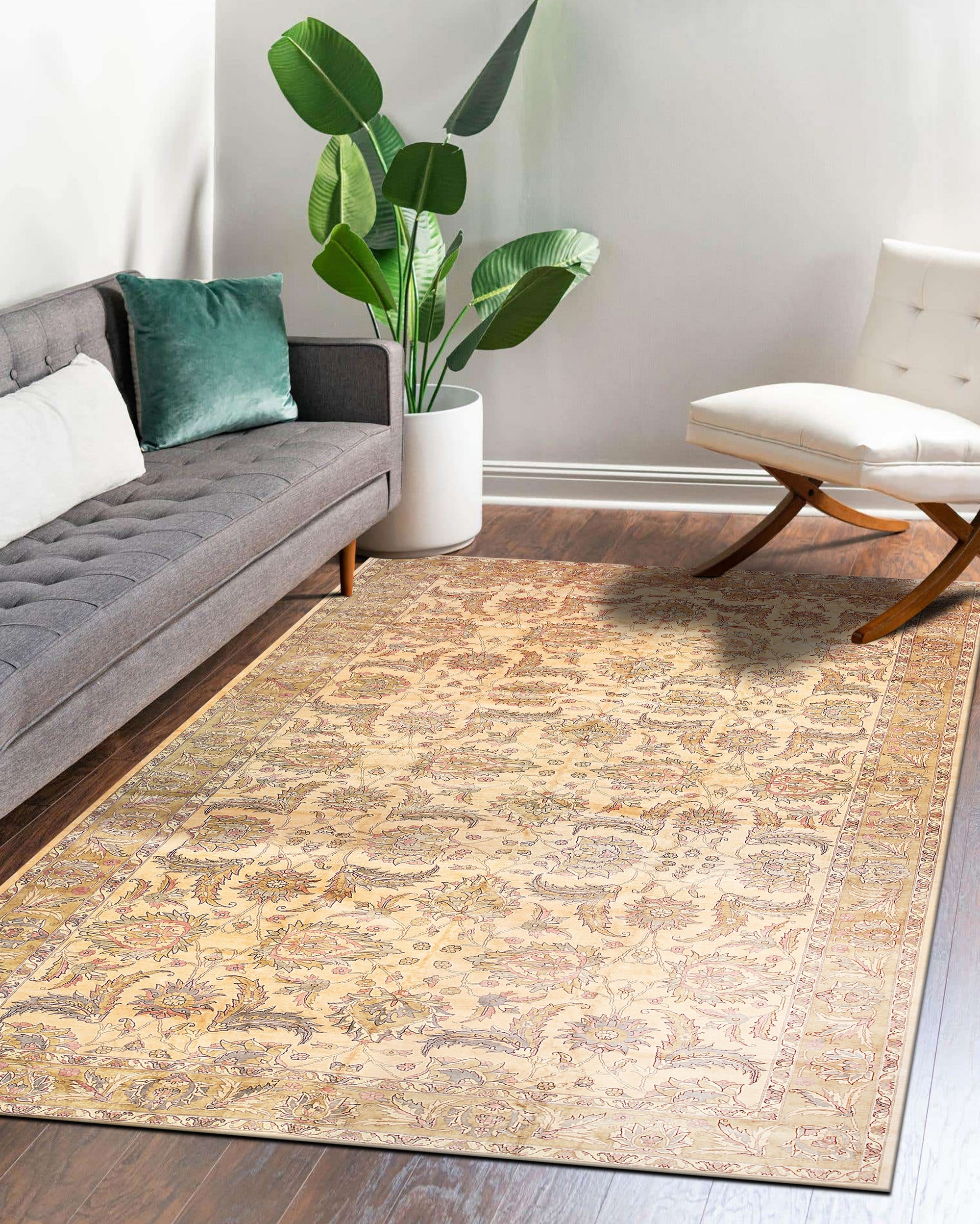 Vibrant Agra Beige Hand Knotted Wool Rug displayed in a bright, modern living room setting. Its beige tones and intricate hand-knotted wool construction add warmth and subtle pattern to the space.