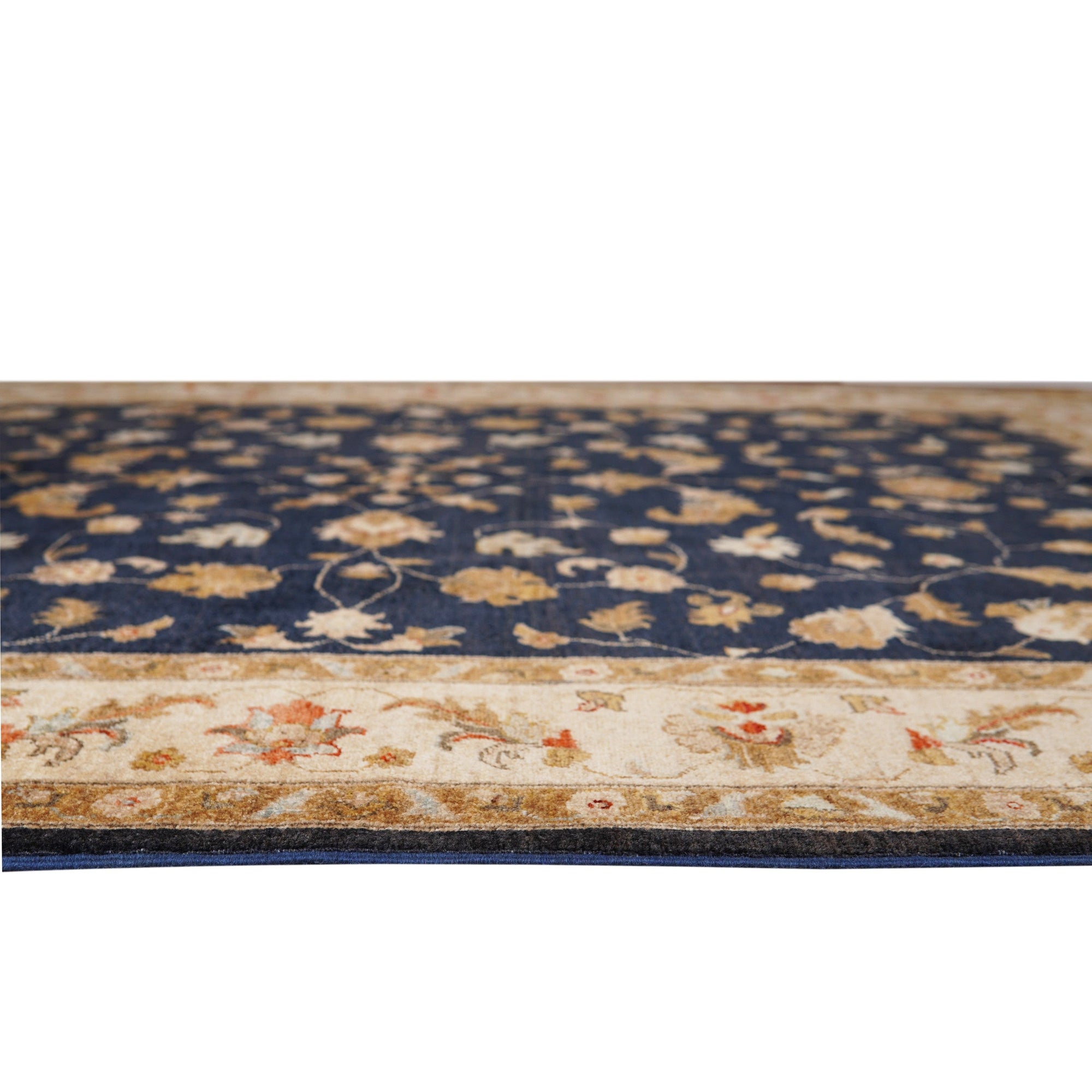 Stylish Peshawar Navy Hand Knotted Wool Rug, its deep navy field punctuated by intricate, traditional geometric patterns, creating a warm and inviting ambiance in a well-lit interior space.
