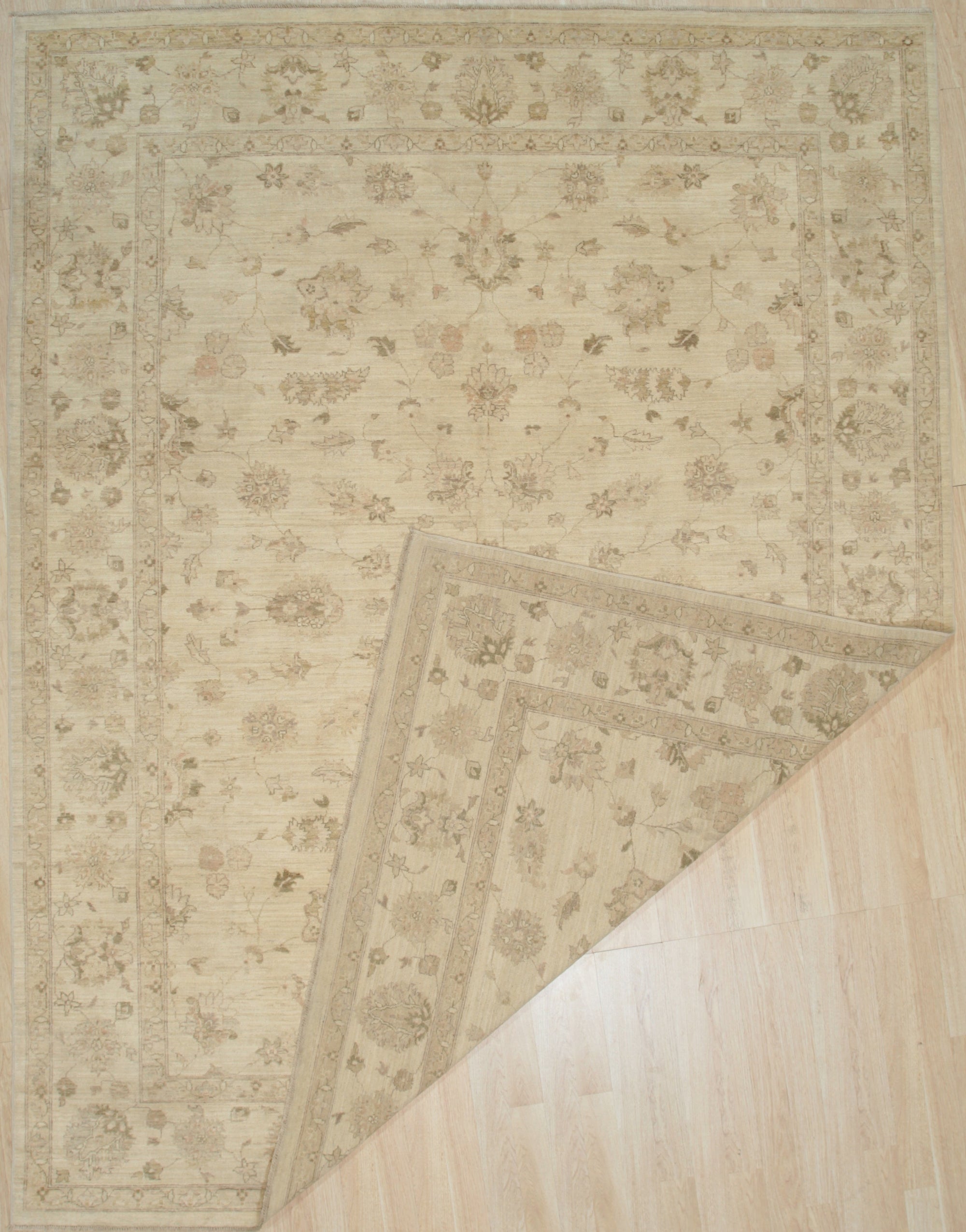 Vibrant Oriental Beige Hand Knotted Wool Rug, a richly patterned beige wool rug with intricate floral and geometric motifs, displayed on a light-colored floor.