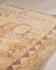 Violet Elegant Beige Hand Knotted Wool Rug, showcasing intricate floral and geometric patterns in soft beige and violet hues, with visible hand-knotted texture and fringe detail.