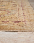Violet Elegant Beige Hand Knotted Wool Rug, soft beige backdrop intricately woven with violet accents, seen adding warmth and elegance to a living space.