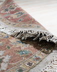 Comfortable Timeless Ivory Hand Knotted Wool Rug displayed in a living room setting, showcasing its soft texture and subtle design.