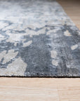 Amara Rhea Ivory Hand Knotted Rug, showcasing a plush, neutral foundation with a subtle, intricate pattern.