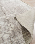 Celia Oushak Gray Hand Knotted Wool Rug, its plush gray wool pile and intricate Oushak design softening a contemporary living space.