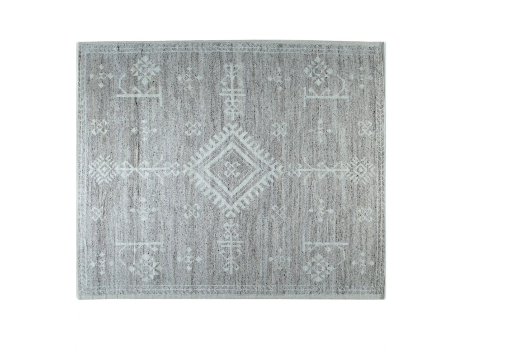 Celia Oushak Gray Hand Knotted Wool Rug, its intricate Oushak design gracing a light-filled room, subtle gray tones softening the traditional patterns.