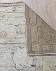 Nadia Harlow Ivory Hand Knotted Silk Rug, showcasing its intricate design and luxurious silk sheen in a detailed view.