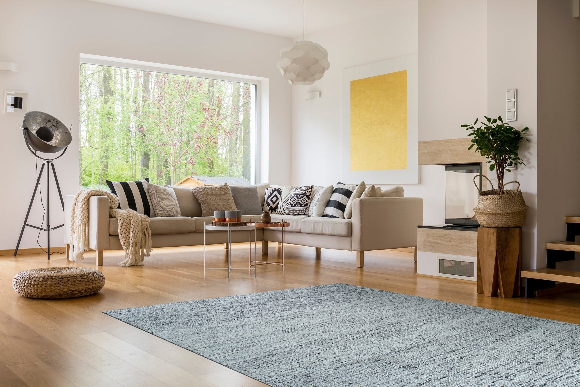Refined Exquisite Gray Hand Knotted Silk Rug, showcasing a subtle sheen and intricate knotwork, lies flat in a neutral space, its cool gray tones adding sophistication to the room.