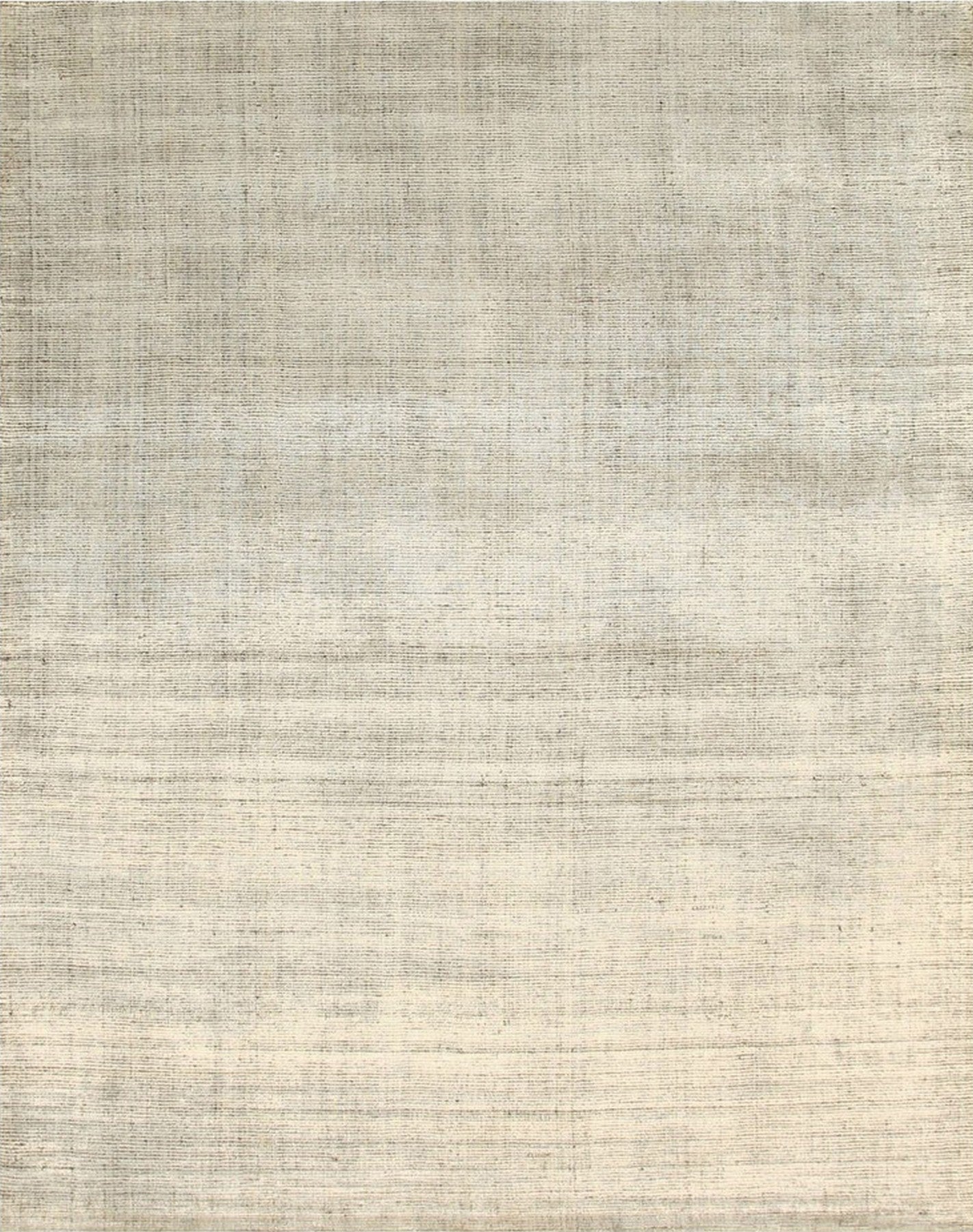 Isolated view of Talia Artisan Gray Handmade Rug, showcasing its subtle textures and intricate, geometric pattern.