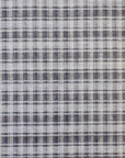 Isolated view of Radiant Tessa Blue Handmade Bamboo Silk Rug, highlighting its lustrous sheen and intricate, abstract pattern.