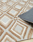 Sumptuous Diamond Brown Hand Knotted Wool Rug, its diamond pattern radiating warmth in a softly lit setting. Hand-knotted wool creates a luxurious texture, grounding the space with its rich brown hues.