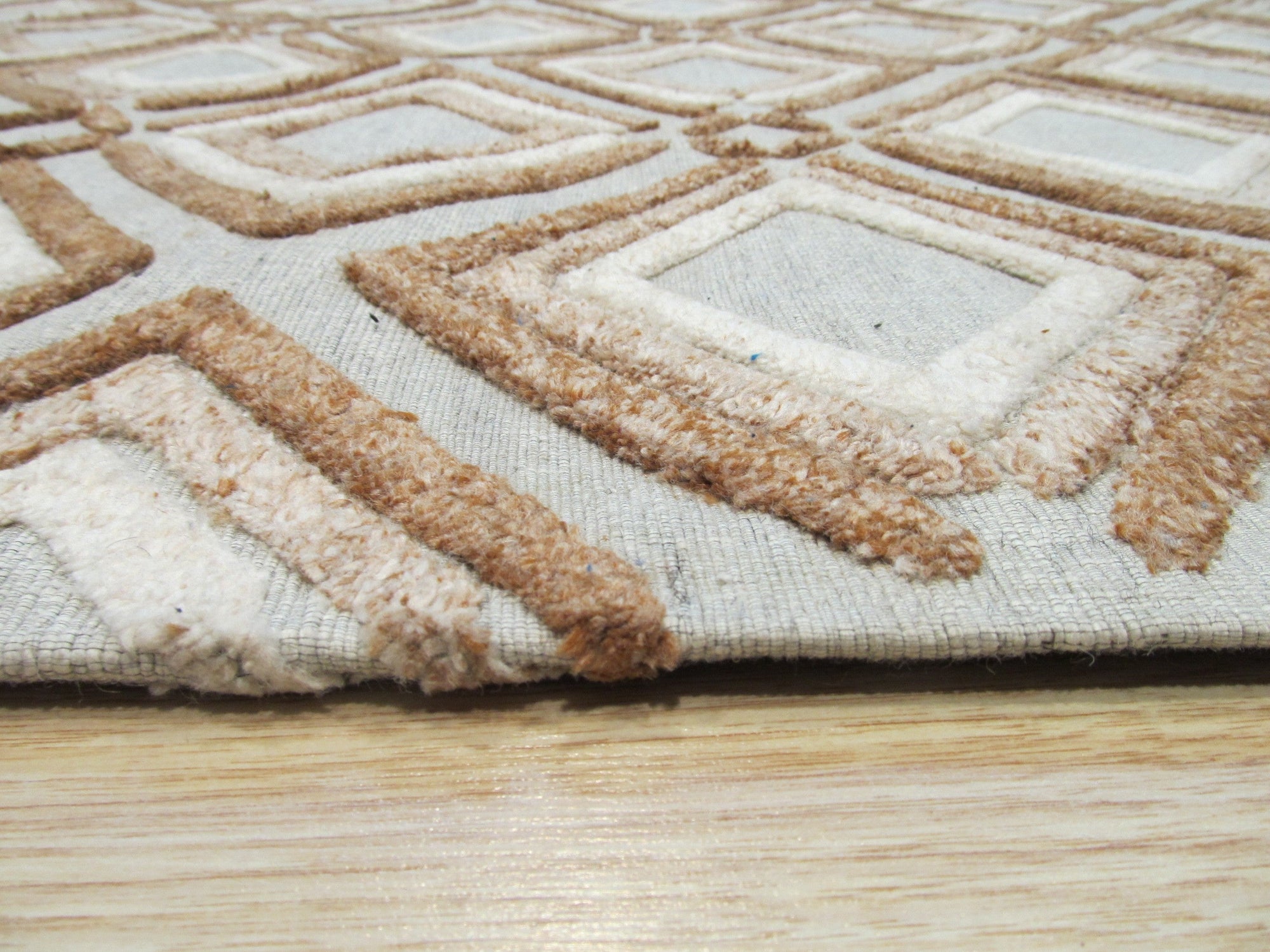 Sumptuous Diamond Brown Hand Knotted Wool Rug, showcasing rich brown tones and a subtle diamond pattern in a real-life room setting.