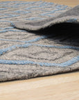 Timeless Trellis Gray Hand Knotted Wool & Viscose Rug displayed in a living room setting, showcasing its elegant trellis pattern and subtle gray tones complementing neutral furniture.