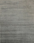 Isolated view of Refined Majestic Silver Handmade Wool & Viscose Rug, showcasing its intricate, shimmering silver design.