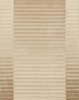 Isolated view of Rhea Quinn Brown Handmade Wool & Viscose Rug, showcasing its swirling, abstract design in shades of brown and cream.