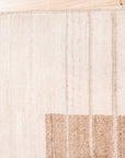 Rhea Quinn Brown Handmade Wool & Viscose Rug, featuring a warm, earthy brown palette with subtle sheen from viscose fibers, adds textured sophistication to a living room setting.