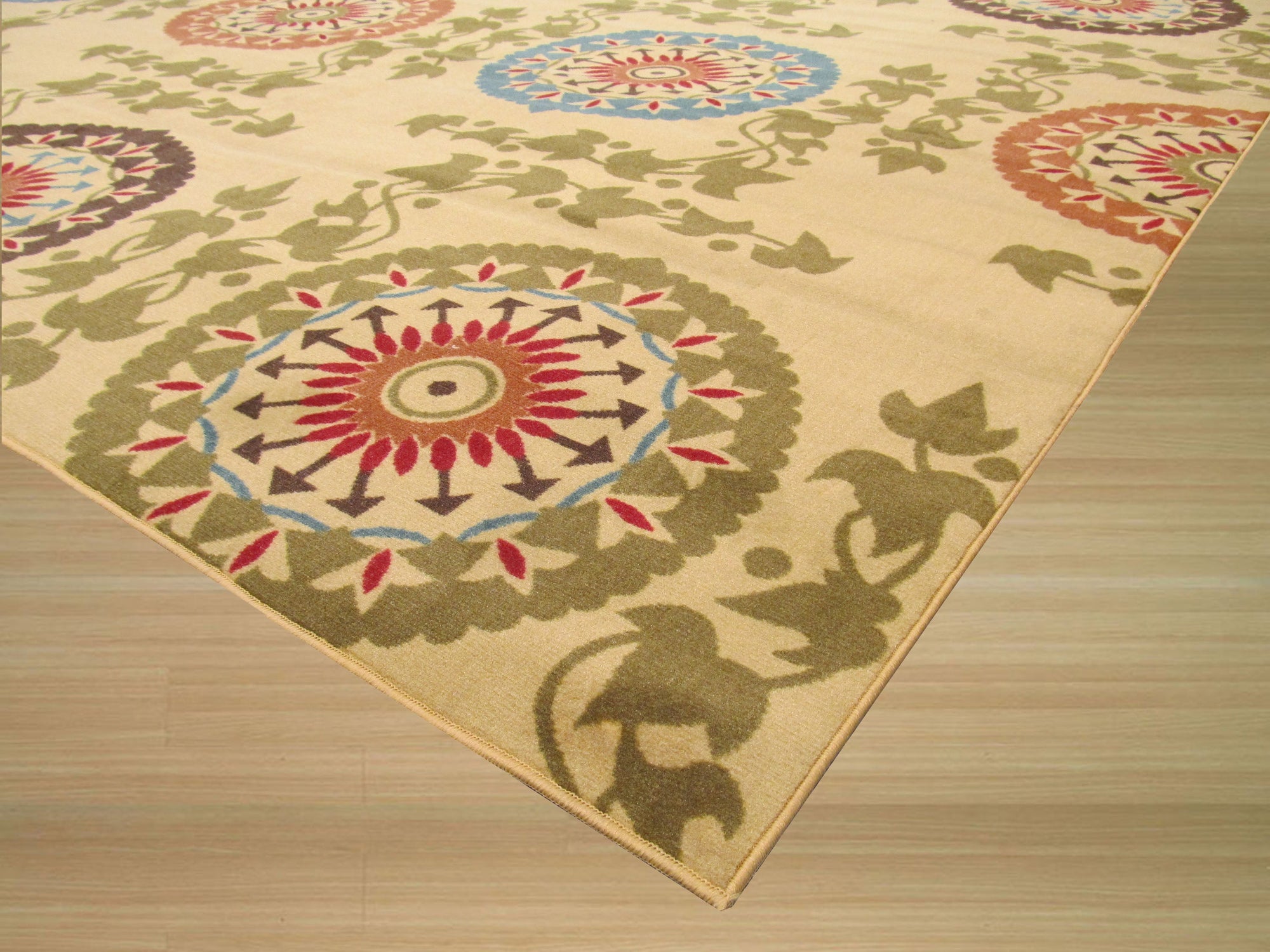 Cozy Chic Ivory Machine Made Rug, a soft ivory rug with subtle texture, partially visible under a modern light wood coffee table in a bright, airy living space.