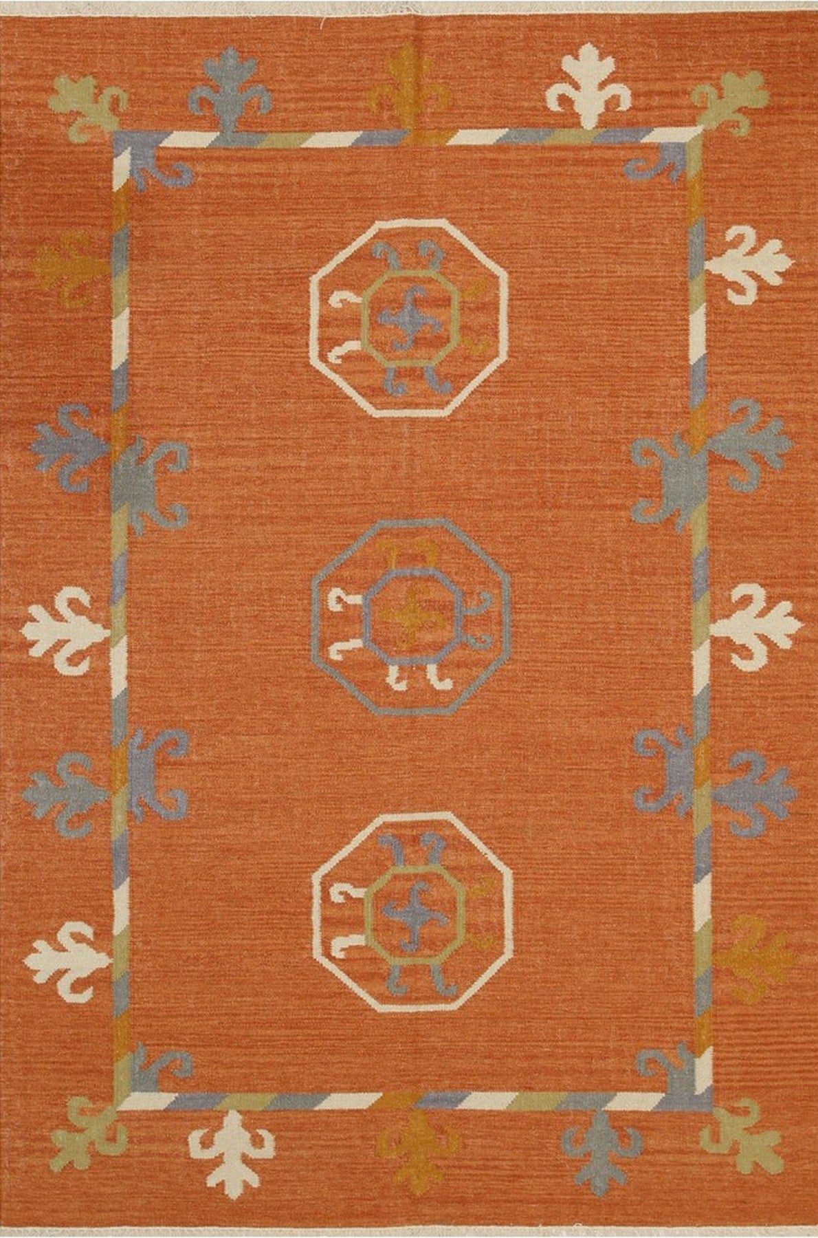 Isolated view of Maya Kilim Rust Flatweave Wool Rug, showcasing its intricate geometric pattern in warm rust tones and traditional flatweave construction.