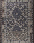 Isolated view of Brenda Jasmine Brown Flatweave Wool Rug, showcasing its intricate geometric pattern in shades of brown and cream on a flatwoven wool surface.