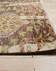 Iris Sophisticated Brown Hand Knotted Wool Rug, a richly textured wool rug with intricate knotting and a sophisticated brown palette, seen in a room setting enhancing its warmth and depth.