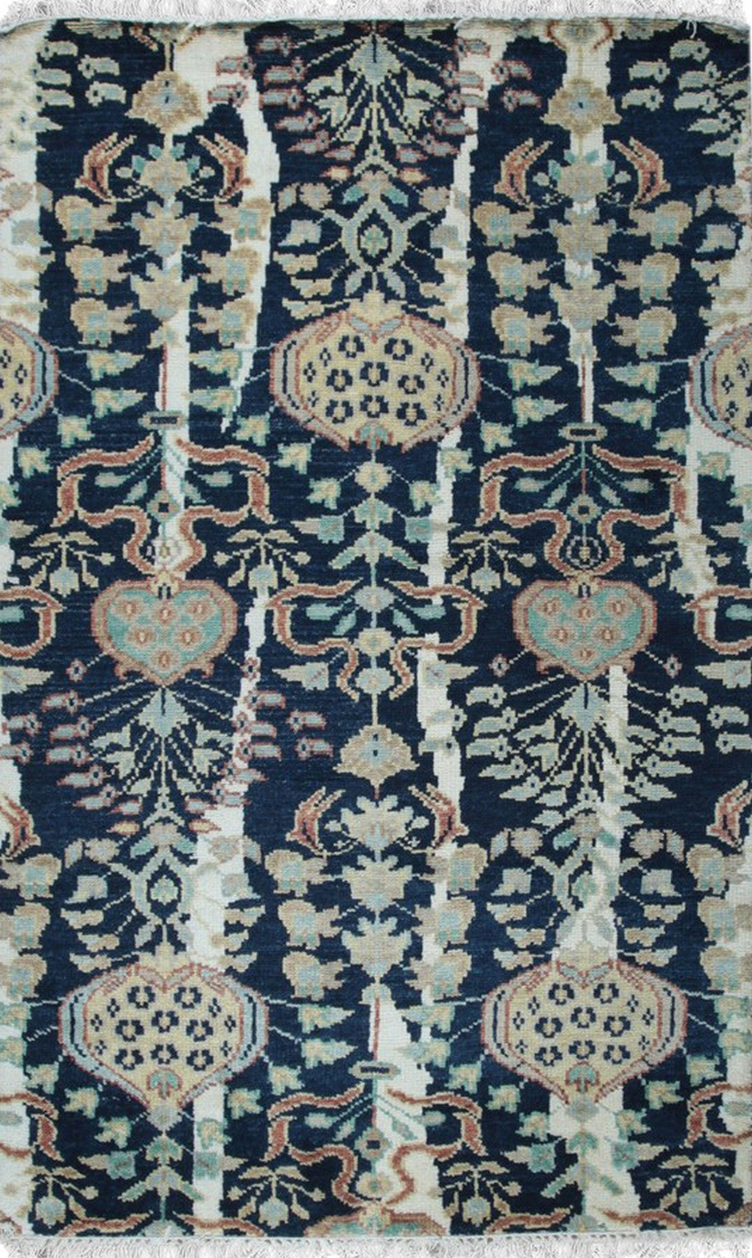 Isolated view: Zinnia Louie Blue Hand Knotted Wool Rug displays a vibrant, floral-inspired design with intricate detailing across its surface.