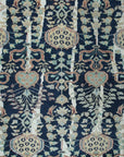 Isolated view: Zinnia Louie Blue Hand Knotted Wool Rug displays a vibrant, floral-inspired design with intricate detailing across its surface.