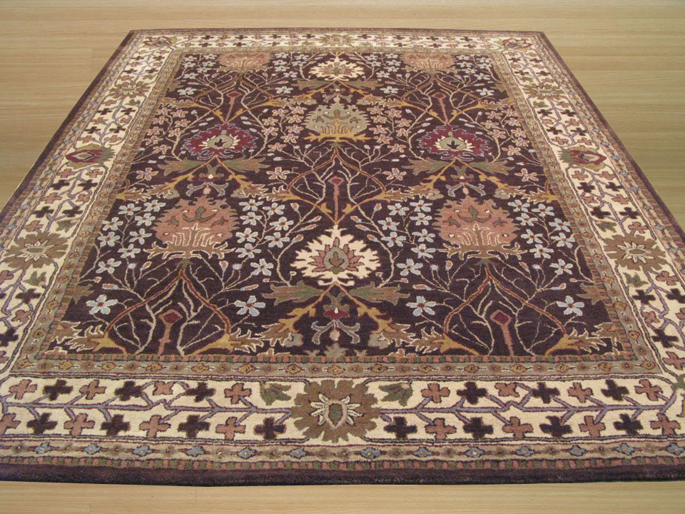 Luna Delicate Brown Hand Tufted Wool Rug, a delicate brown wool rug with subtle variations in tone, seen elegantly displayed showcasing its texture and hand-tufted construction.