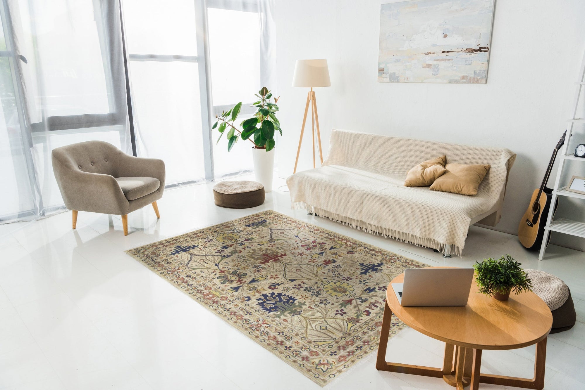 Graceful Exquisite Ivory Hand Tufted Wool Rug, showcased in a bright living room; natural light illuminates the ivory wool pile, highlighting its hand-tufted construction and subtle texture underfoot.
