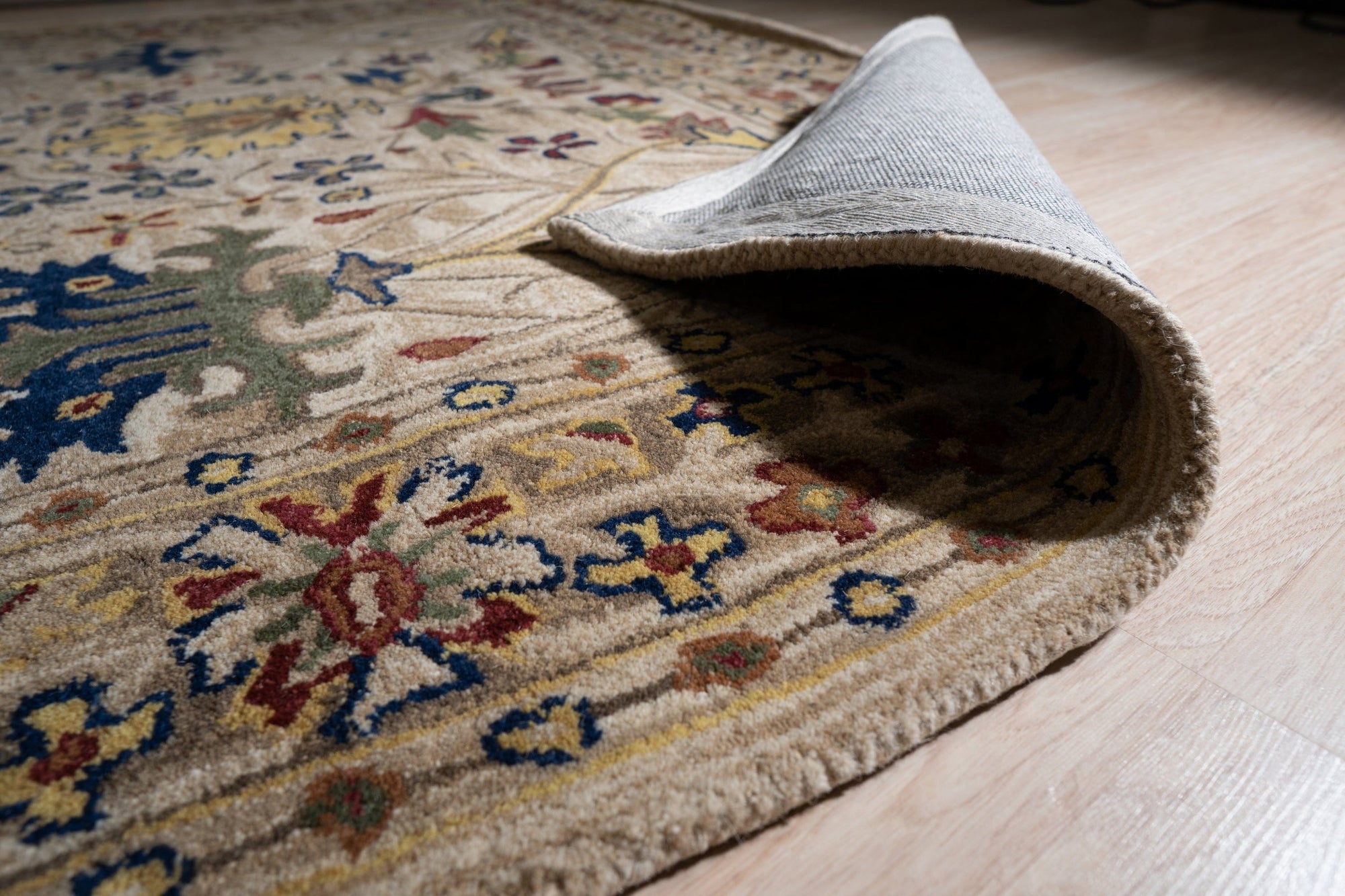 Graceful Exquisite Ivory Hand Tufted Wool Rug, soft ivory textures in a living room setting, hand-tufted wool construction bringing warmth and elegance to the space.