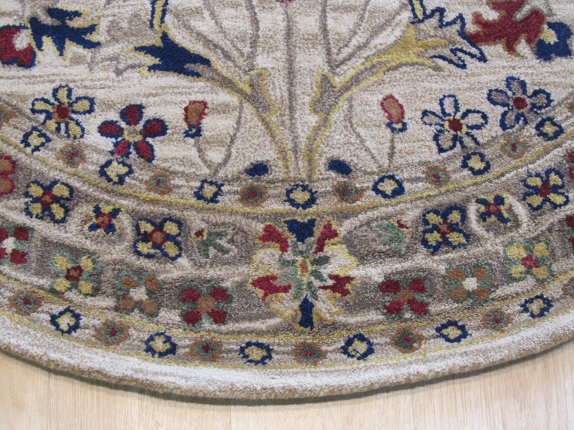 Graceful Exquisite Ivory Hand Tufted Wool Rug, a luxurious ivory wool rug with a hand-tufted texture, graces a light-filled space.