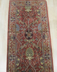 Lydia Vibrant Red Hand Tufted Wool Rug, its fiery reds and intricate hand-tufted texture warming a contemporary living space with neutral furniture and natural light.