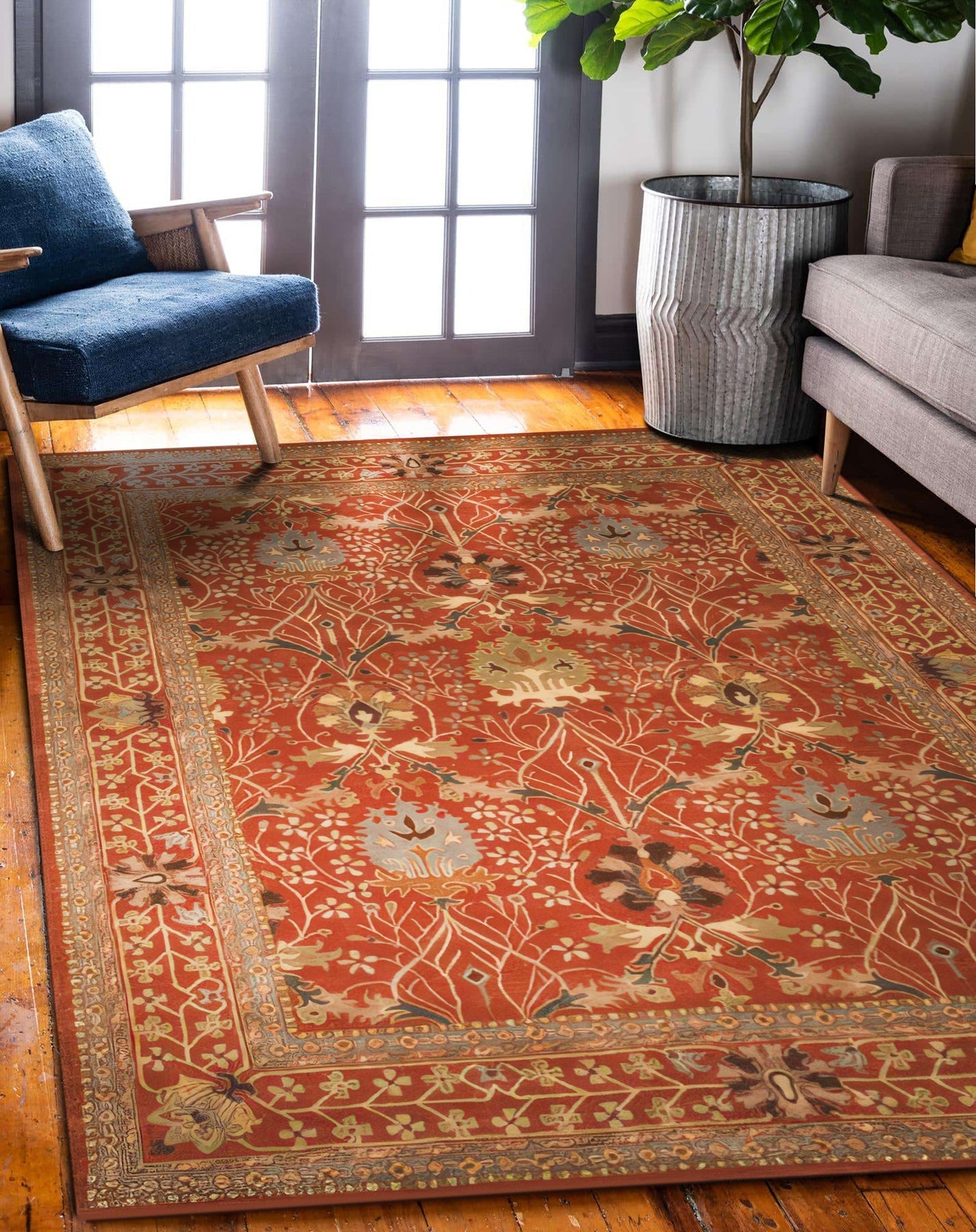 Lydia Vibrant Red Hand Tufted Wool Rug anchors a light-filled living space; vibrant red wool pile offers a warm contrast to neutral furniture, showcasing its hand-tufted texture.