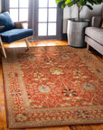 Lydia Vibrant Red Hand Tufted Wool Rug anchors a light-filled living space; vibrant red wool pile offers a warm contrast to neutral furniture, showcasing its hand-tufted texture.