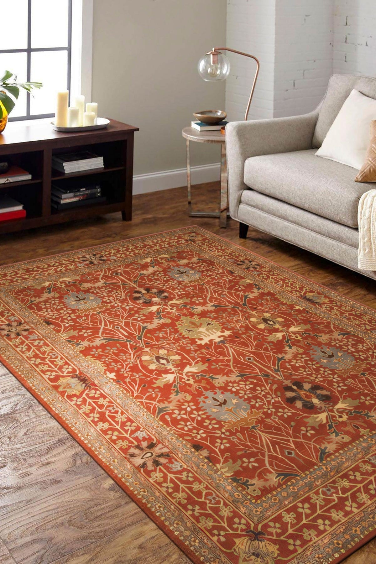 Lydia Vibrant Red Hand Tufted Wool Rug displayed on a light wood floor. Rich crimson hues and plush wool texture radiate warmth and sophistication in this detail shot. Hand-tufted construction promises luxurious comfort.