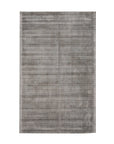 Isolated view of Sloane Maya Silver Handmade Rug, highlighting its intricate, geometric pattern woven in varying shades of silver and grey, creating a textured, modern design.