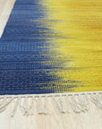 Chic Dazzling Yellow Flatweave Wool Rug, a vibrant yellow wool rug with a flatweave construction, lending a modern touch to a living room setting.