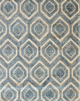 Isolated view of Maya Sophisticated Ivory Hand Tufted Wool & Viscose Rug, showcasing its intricate, possibly geometric or abstract, design.