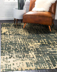 Elena Stylish Blue Hand Knotted Sari-Silk Rug, blending vibrant blues and subtle textures in a hand-knotted sari-silk construction, seen in a styled interior setting.