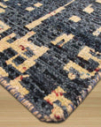 Elena Stylish Blue Hand Knotted Sari-Silk Rug, showcasing a richly textured blue surface with subtle variations in tone and sheen, its hand-knotted construction evident in the intricate details and luxurious drape.
