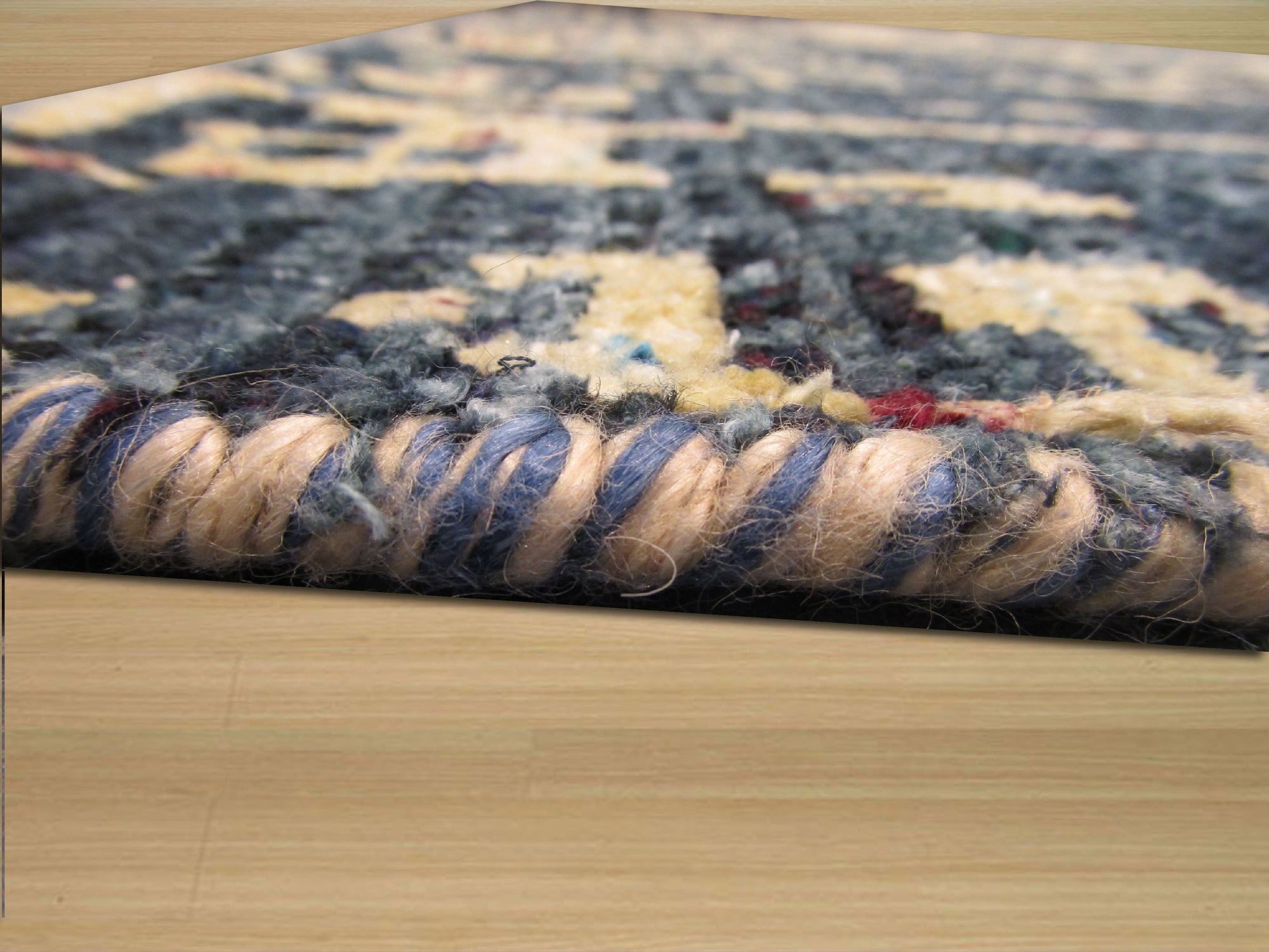 Elena Stylish Blue Hand Knotted Sari-Silk Rug, showcasing intricate hand-knotted details in shimmering blue sari silk, seen in a softly lit interior setting, highlighting its texture and luxurious feel.