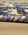 Elena Stylish Blue Hand Knotted Sari-Silk Rug, showcasing intricate hand-knotted details in shimmering blue sari silk, seen in a softly lit interior setting, highlighting its texture and luxurious feel.