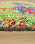 Sarrah Oriental Green Hand Knotted Sari-Silk Rug, shimmering with emerald and jade hues, presents an intricate traditional design rendered in luxurious sari silk.