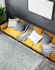 Sleek Rustic Beige Handmade Wool Rug, a warm beige wool rug with subtle texture, lies on a light hardwood floor, showcasing its rustic yet modern design.