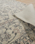 Sleek Rustic Beige Handmade Wool Rug, displaying warm beige tones and subtle texture across a living room floor, offering a soft, hand-woven grounding element.