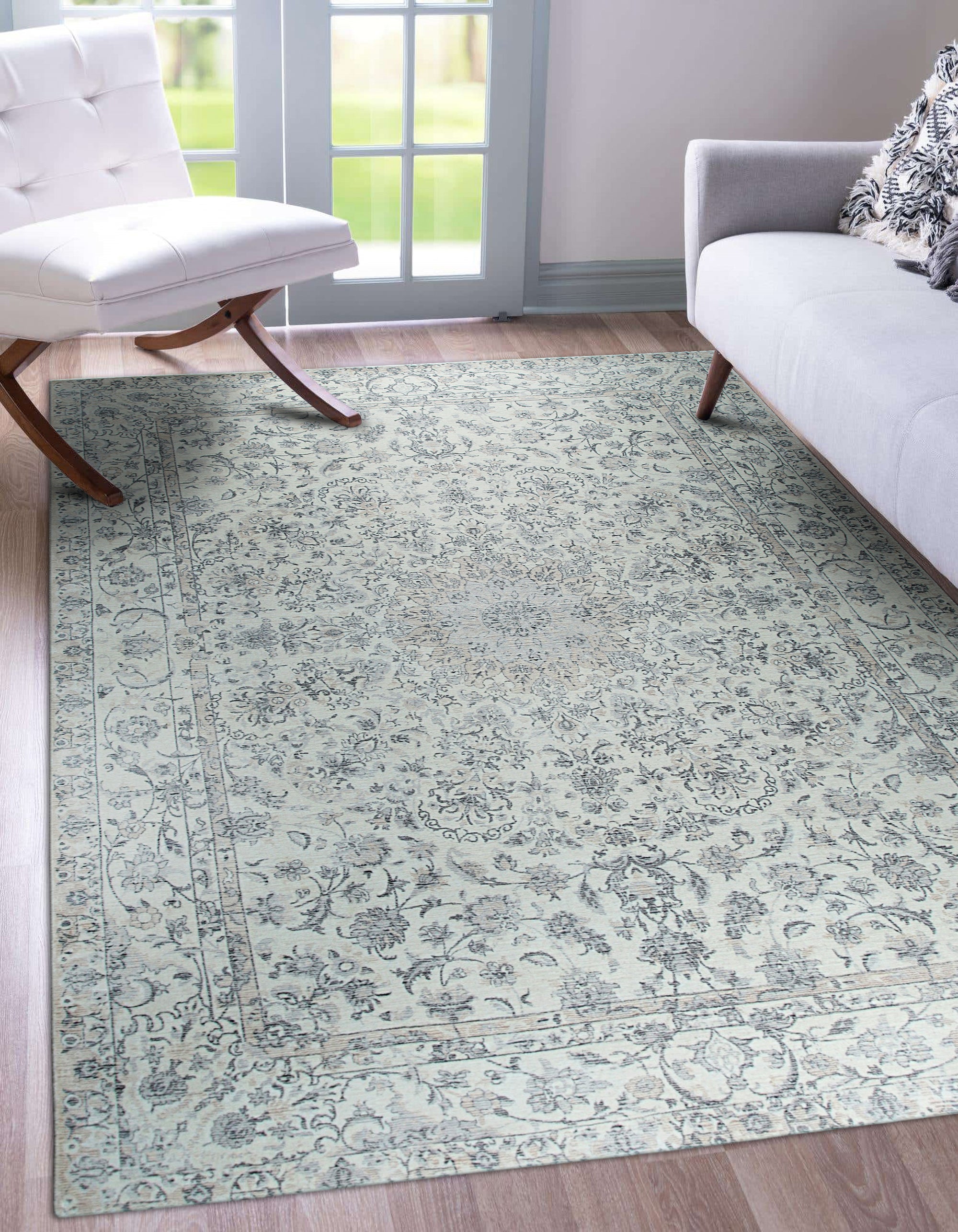 Sleek Rustic Beige Handmade Wool Rug displayed on a light wood floor, showcasing its subtle texture and warm beige tones in a well-lit setting.