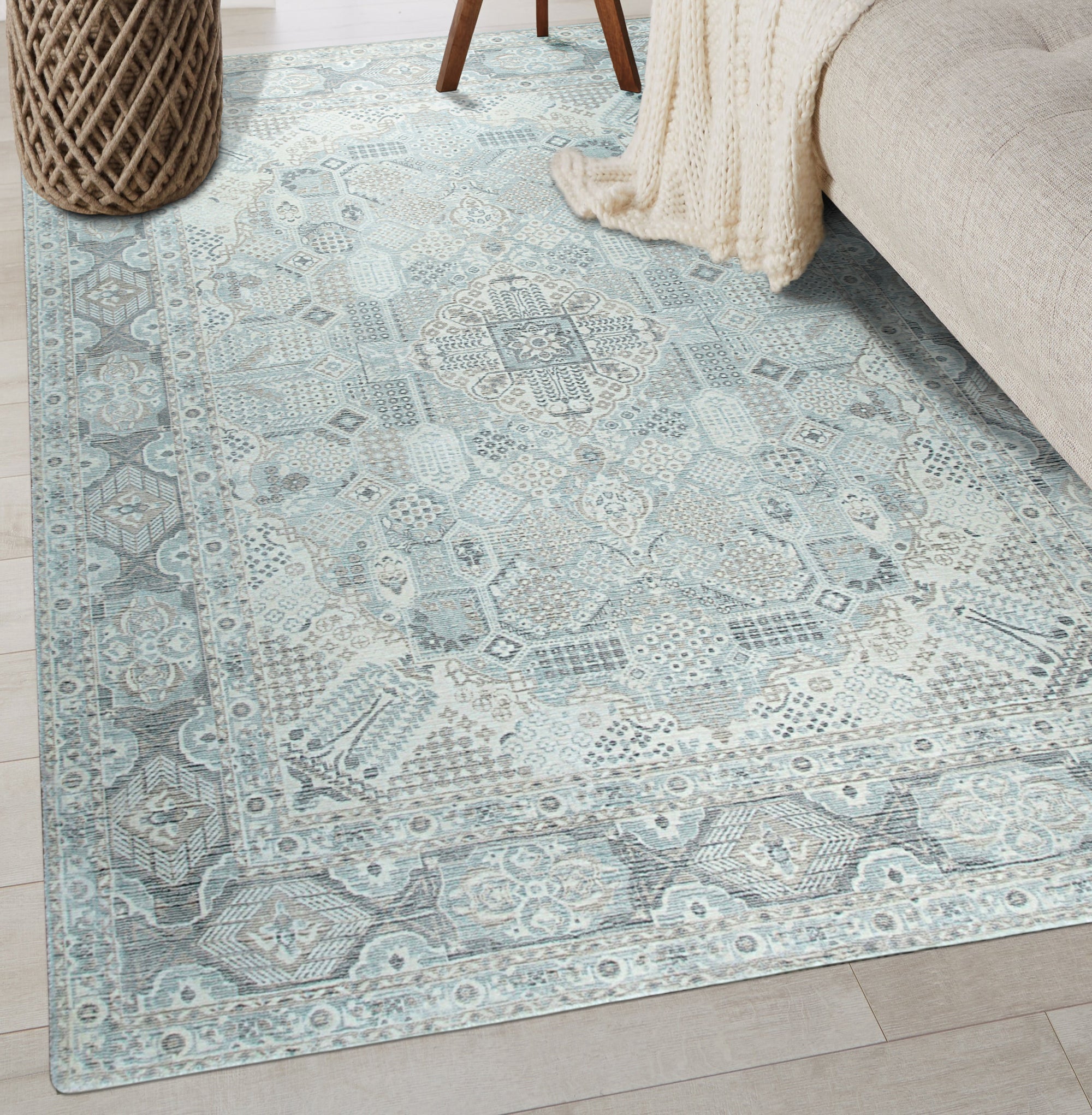 Tessa Bespoke Green Handmade Wool Rug, lush green wool rug with subtle texture variations, enriching a bright living room with natural light filtering through sheer curtains and modern furniture accents.
