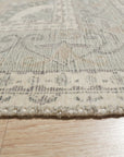 Selene Oriental Green Handmade Wool Rug, showcasing an intricate, earthy green oriental pattern; luxurious hand-knotted wool construction adds depth and texture to its lush pile.