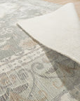 Selene Oriental Green Handmade Wool Rug, presenting a complex floral and geometric pattern in shades of green, cream, and rust, woven from wool with visible texture and intricate detailing.