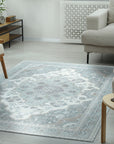 Selene Oriental Green Handmade Wool Rug displayed in a room setting, showcasing its vibrant green hues and intricate oriental pattern. Wool construction and handmade detail visible.