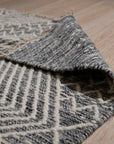 Celia Kilim Blue Handmade Wool Rug, a vibrant blue and cream kilim rug with geometric patterns, adding warmth and texture to a brightly lit living room setting.