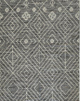 Isolated view of Luxurious Kilim Charcoal Handmade Wool Rug, showcasing its geometric pattern in shades of charcoal gray and off-white.